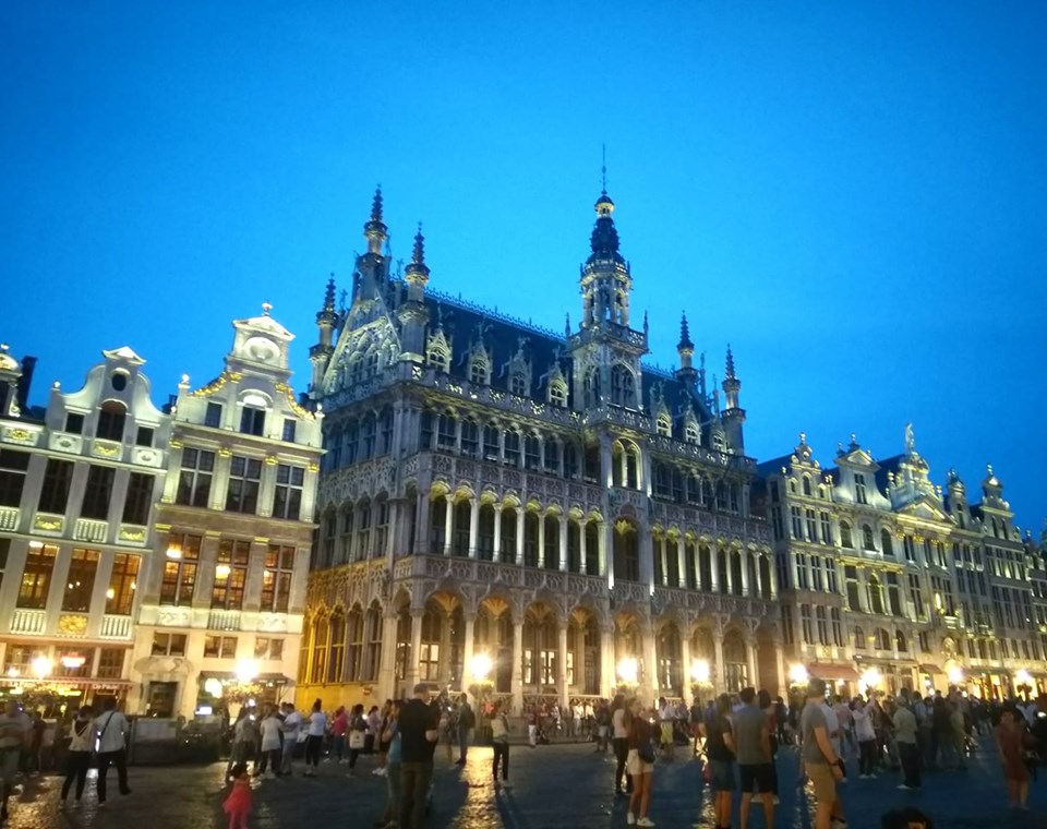 The buildings of the Grande Place in Brussels lit up at night